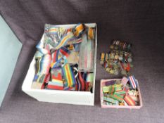 A collection of British Miniature Medals, Medal Ribbons and new Medal Bars