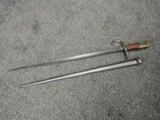 A French Gras Rifle Bayonet, model 1874 with scabbard, scabbard and blade marked 65838, blade length