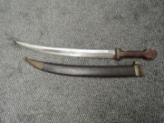 A Russian Artillery Kindjal 1914 with two edged curved blade, wooden grip, blade marked possibly