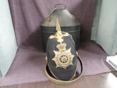 A late 19th/early 20th century East Yorkshire Regiment Black Cloth Spiked Helmet with cap badge