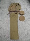 A WWII period Military Jacket, Trousers and Beret Border Regiment, Jacket has metal pips to