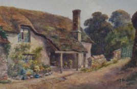 Lewis Mortimer, (19th/20th century), a watercolour, thatched country cottage, signed and dated 1920,