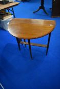 An early 20th Century mahogany Sutherland table