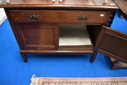 An early 20th Century oak side cabinet