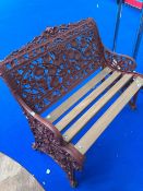 A Victorian Cast Iron Coalbrookdale Nasturnium pattern two seater garden bench having been