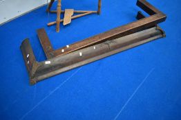 Two fire guards one in copper and one in oak.