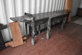 A large Victorian stained and carved oak mirror back sideboard, the mirror back with profuse scroll,