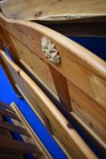 A modern pine double bed frame