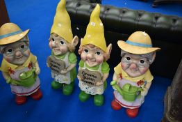 Four oversized toughened plastic garden gnomes