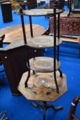A 19th Century three tier etage and an occasional table with marquetry top (af)