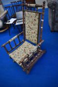 A 19th Century stained frame American rocking chair