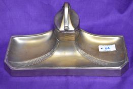 An Art Nouveau metal ink well , in the style of WMF.