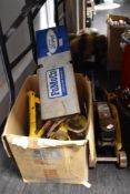 A set of axle stands, a jack and a selection of gaskets, possibly Ford.