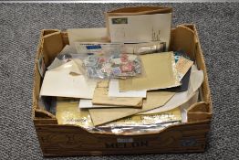 A collection of mixed stamps including sheets of unused stamps, first day covers and ephemera such