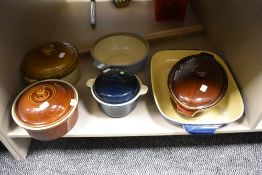 An assortment of casserole dishes and a oven dish, including Denby stoneware.