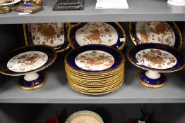 A selection of late 19th Century W A Adderley and Co tableware comprising 12 dining plates, 2 tazzas