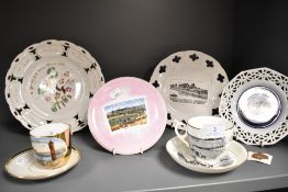 Two 19th Century porcelain souvenir teacups and saucers, both illustrated with scenes of