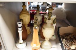 Ten traditional and vintage table lamp bases, including turned wood and Alabaster.