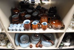 A large collection of vintage Denby table ware, in brown and blue colourway, inclduing tea and