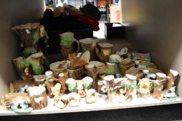 A large collection of Hornsea pottery Flora and Fauna ware, including large squirrel vase with
