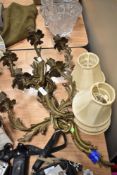 A pair of gilt metal Rococco style three branch wall light fittings