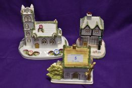 Three Coalport bone china ornaments, to comprise 'Village Church', 'The Old Curiosity Shop', & '
