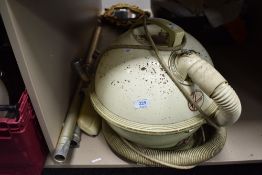 A rare 1950s Hoover 'Constellation' in mint green with accessories, in working order.
