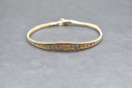 A 9ct gold tri colour gold bracelet, approx 180mm & 5.4g