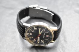 A gent's Wenger 7016X wrist watch having Arabic numeral dial with perimeter seconds dial and date