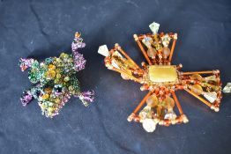 A 1980's vintage beaded brooch by Susan Horth modelled as an oversized frog and another similar