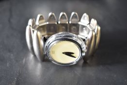 A Swatch 'neanda' wristwatch with elasticated silver coloured bracelet, guarantee and silver