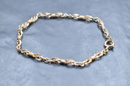 A 9ct gold fancy link bracelet, approx 3.7g