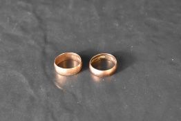 Two 9ct rose gold wedding bands, both size Q & total approx 7.9g