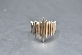 A Shaun Leane silver quill wrap ring inspred by the porcupine quill earrings designed by Leane for