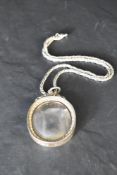 A Victorian Scottish silver pendant of plain oval form on a later silver chain, approx 20' & 61.5g