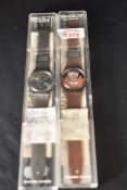 A Swatch 'Glowing Arrow' , with plastic case, original sales receipt and associated guarantee.