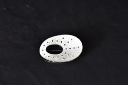 A Norwegian silver and white enamel brooch by Oystein Balle