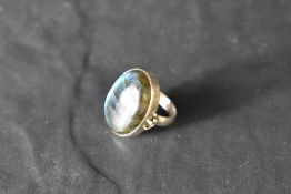 A large labrodite butterfly wing stone silver ring, size Q