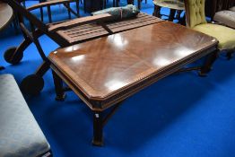 A reproduction yew wood coffee table, approx. 142 x 63cm