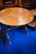 A vintage oak and ply occasional table and a childs solid seat chair