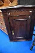 A 19th Century oak corner cupboard