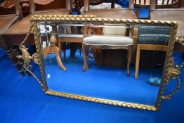 A gilt frame wall mirror having urn and swag decoration