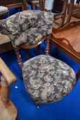 A 19th Century mahogany framed nursing chair having later upholstery