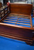 A modern hardwood sleigh bed, in very nice condition