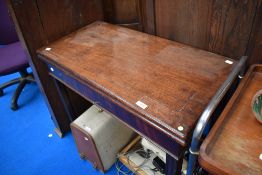 A George III mahogany fold over card table