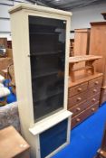 A vintage narrow painted display cabinet , possibly shop fitting