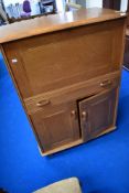 A vintage golden oak Ercol style bureau by Priory