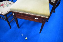 Am Edwardian mahogany piano stool having dralon seat and inlaid decoration on square tapered legs
