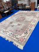 A Chinese carpet square having cream ground
