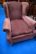 A modern wing back armchair